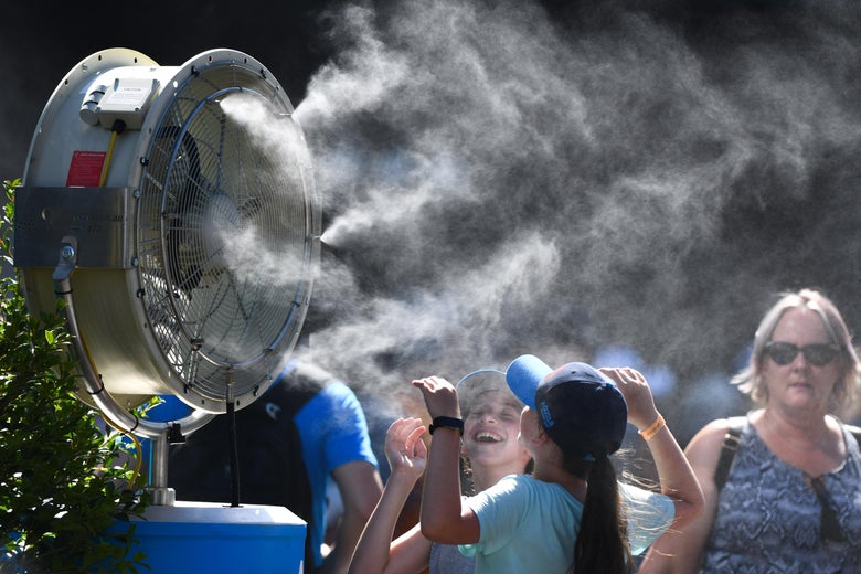 General view of fans cooling spectators in garden square on day three of the 2018 Australian Open at Melbourne Park on January 17, 2018 in Melbourne, Australia.